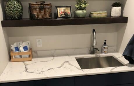 Custom kitchen sinktop counters and floating shelves