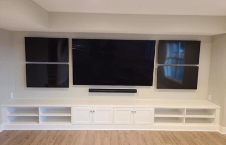 Custom entertainment space cabinets and TV console