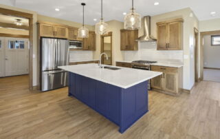 Granite kitchen island and custom wood cabinetry