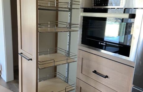 Custom pull out tall organizer cabinet for kitchen space