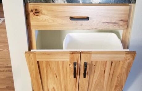 Custom kitchen cabinets for trash receptacles
